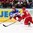 MINSK, BELARUS - MAY 20: Russia's Viktor Tikhonov #10 skates with the puck while Kirill Gotovets #91 of Belarus defends during preliminary round action at the 2014 IIHF Ice Hockey World Championship. (Photo by Andre Ringuette/HHOF-IIHF Images)

